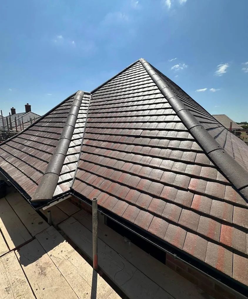 Full re-roof in Peterborough, new tiles and ridges complete