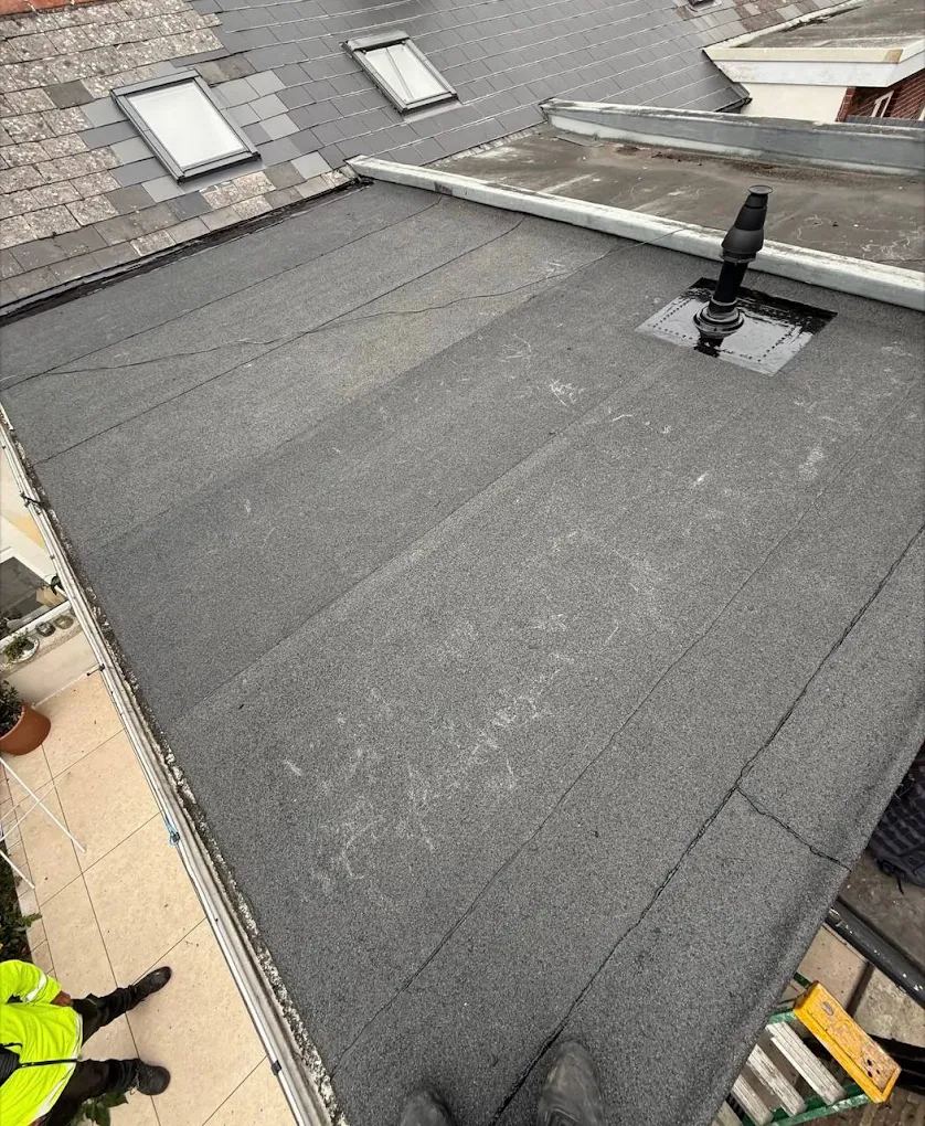 New felt flat roof with vent outlet